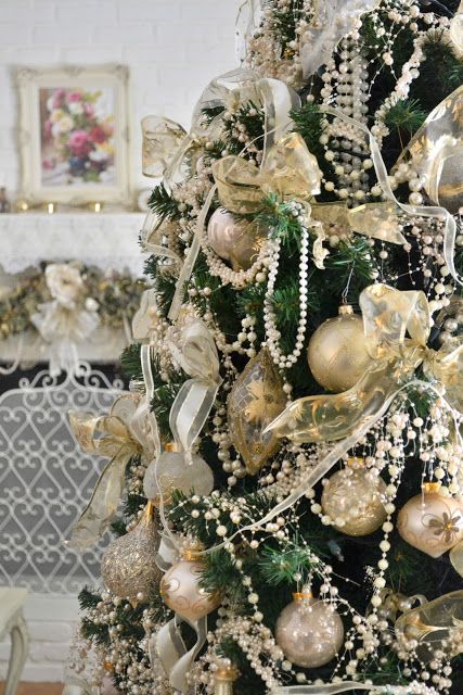 Christmas Tree decorated with with pearl garland & lights  Pearl garland  christmas tree, Victorian christmas tree, Christmas in paris